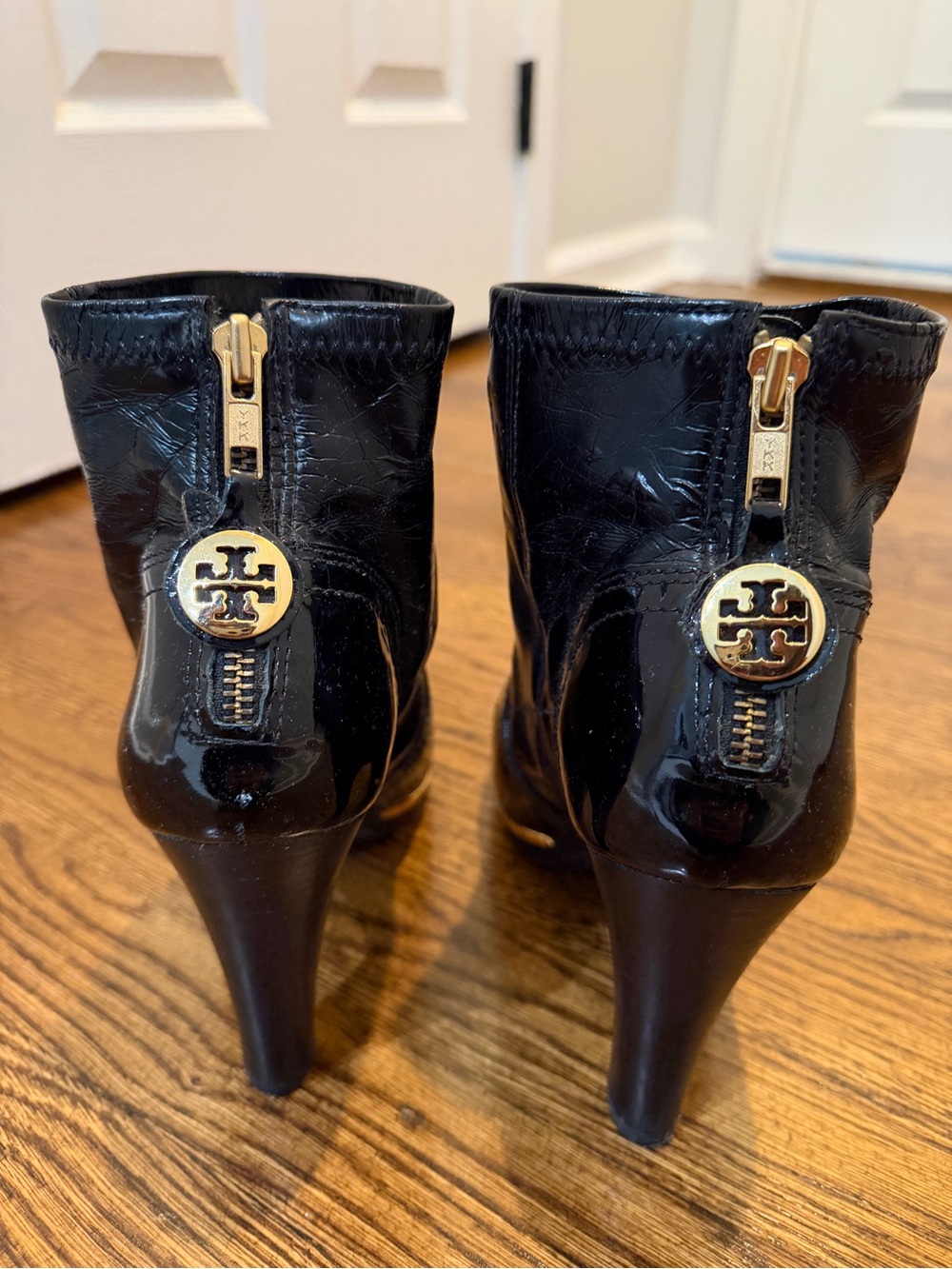 Tory Burch Black Patent Leather Heel Booties with Gold Logo Zip